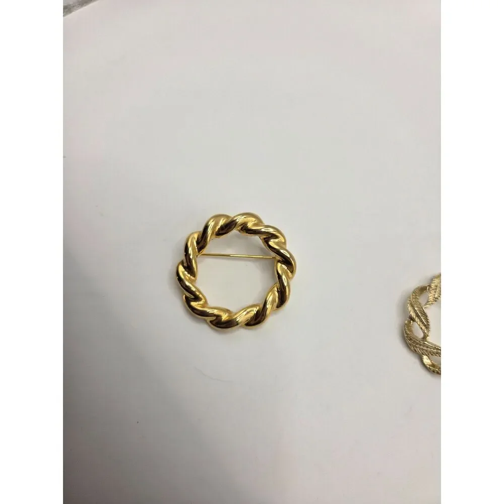 1743. Set of Two Gold Tone Circle Brooch / Pins